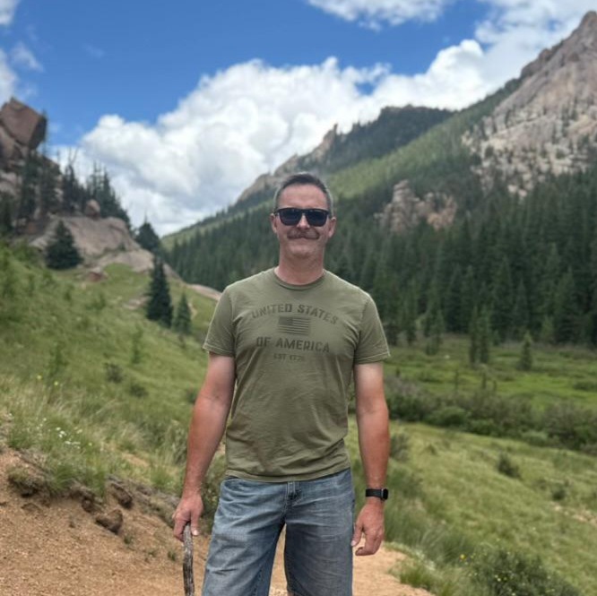 Picture of Micheal Laird and his granddog Remi