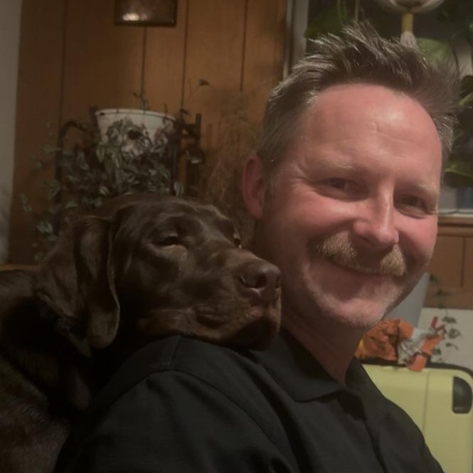 Picture of Micheal Laird and his granddog Remi